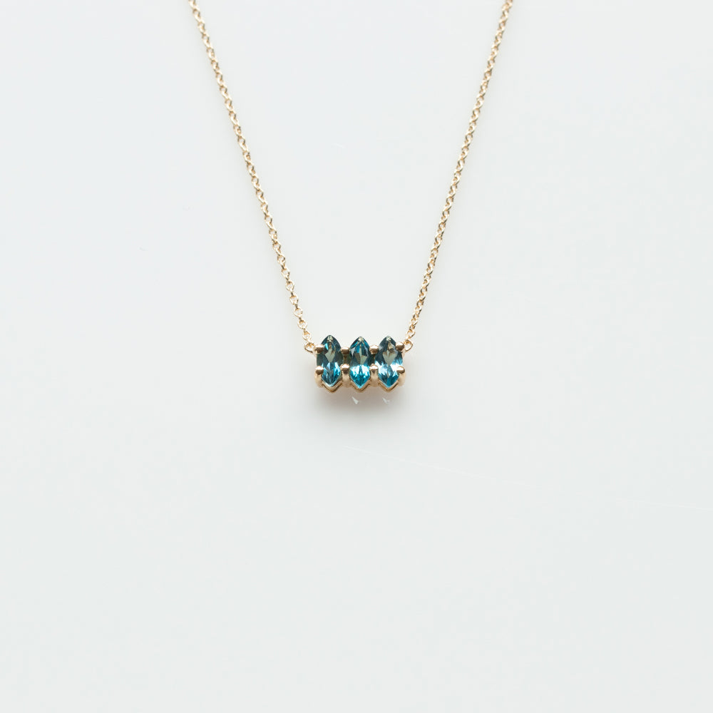 Fizzy blue topaz necklace 14K yellow gold