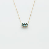 Fizzy blue topaz necklace 14K yellow gold