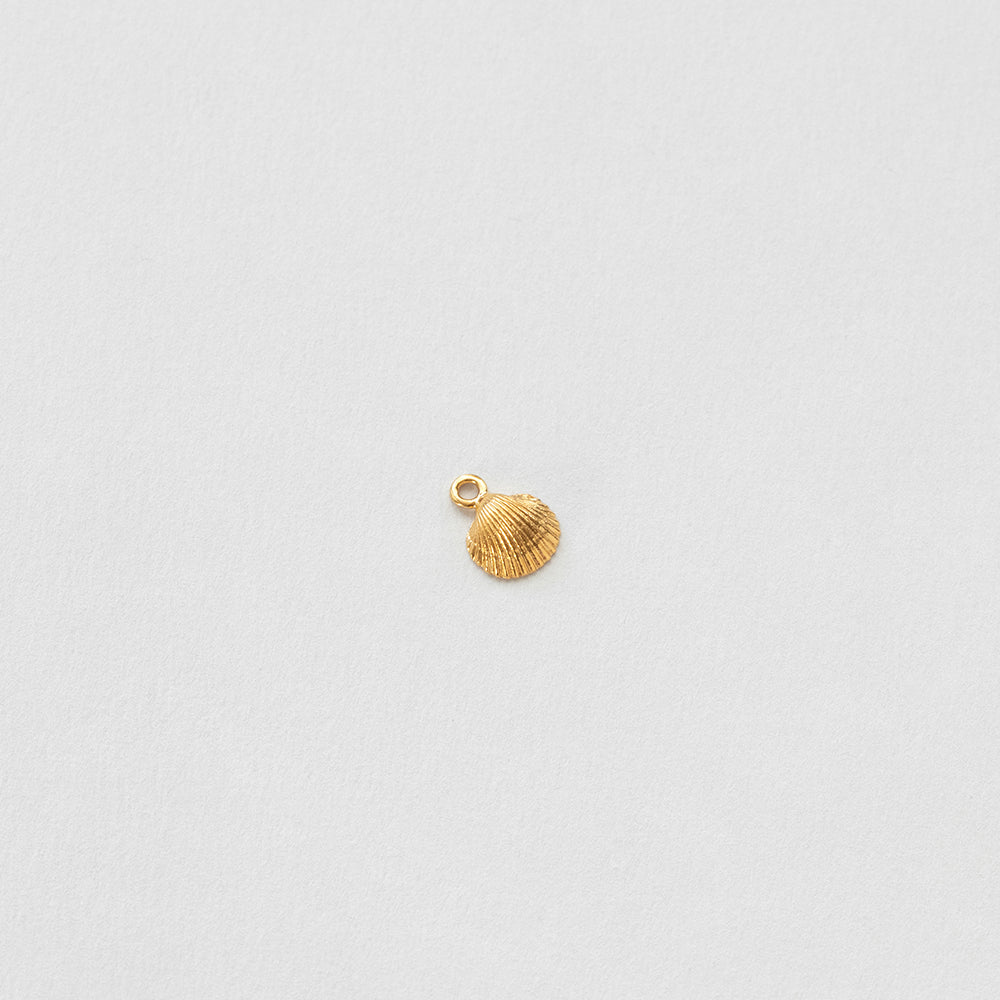 Coquilles jouet charm gold