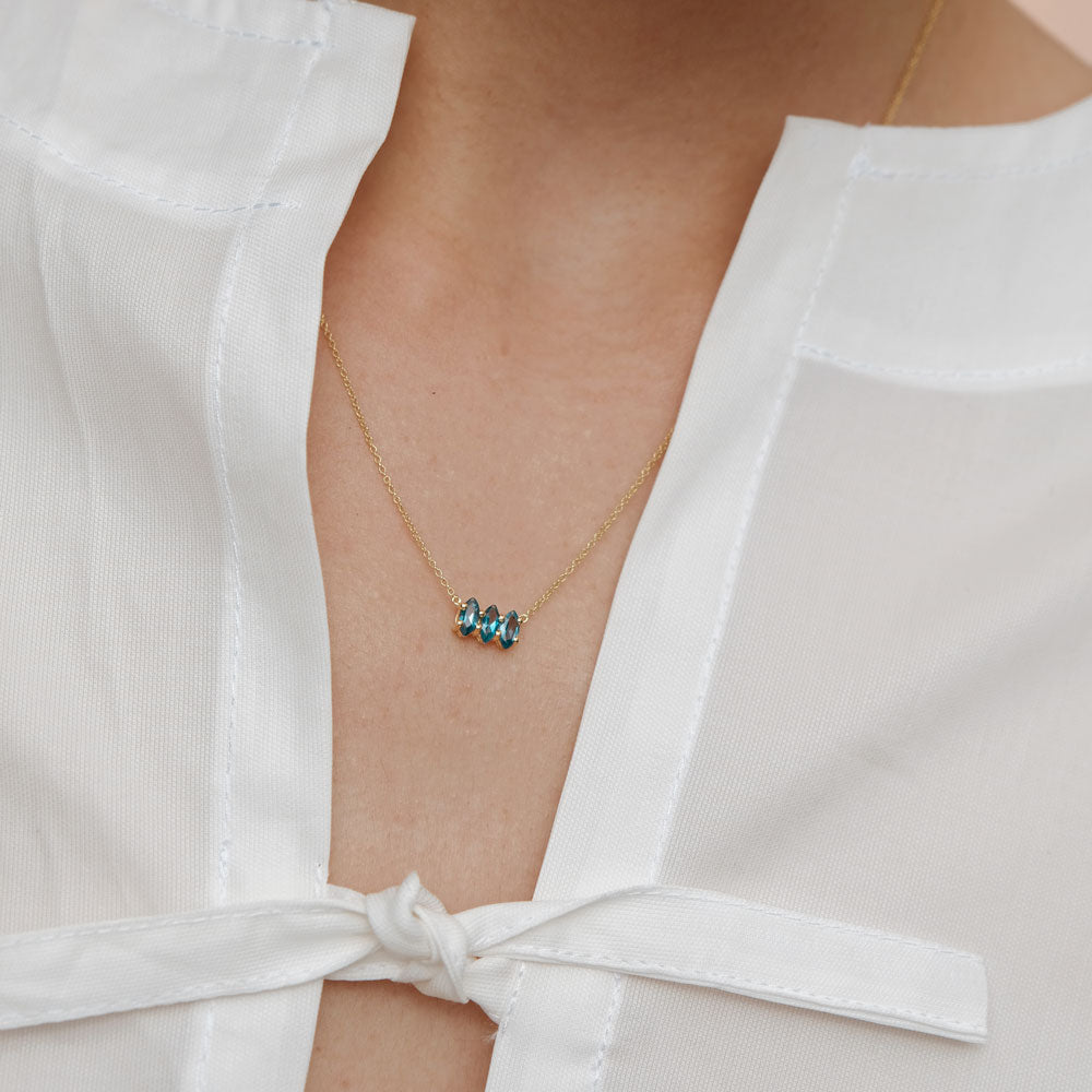 Fizzy blue topaz necklace 14K yellow gold