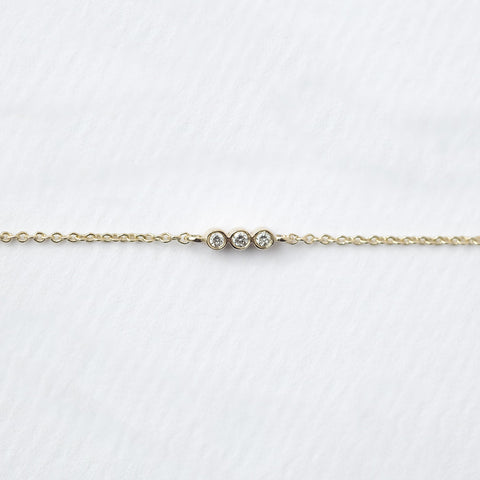 Astro triplet 14K yellow gold bracelet