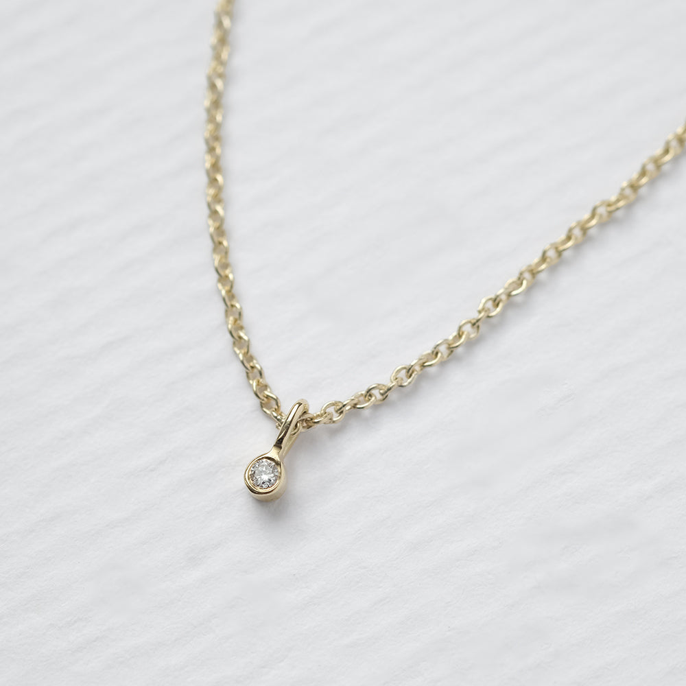 Astro single 14K yellow gold necklace