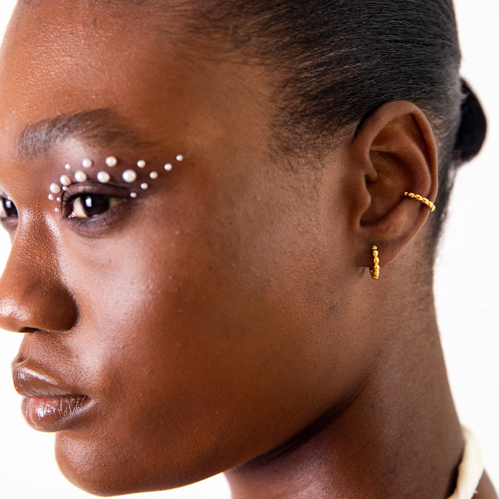 Tiny Treasures puff cuff earring gold