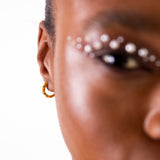 Tiny Treasures navette huggies earrings gold